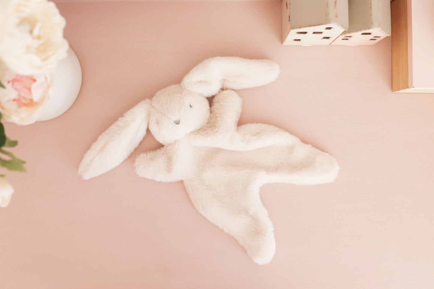 Darcey Bunny Comforter 30cm in ivory, super soft plush with embroidered face, perfect for snuggling babies from birth.