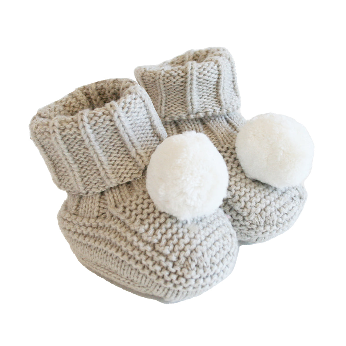 Cute cotton knit baby socks latte color with pom poms, soft and stylish for infants aged 0-6 months.