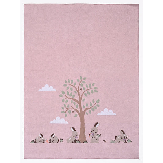 Bunnies Day Out Baby Blanket in Petal Pink featuring playful rabbits and a tree design, 100% cotton and machine washable.