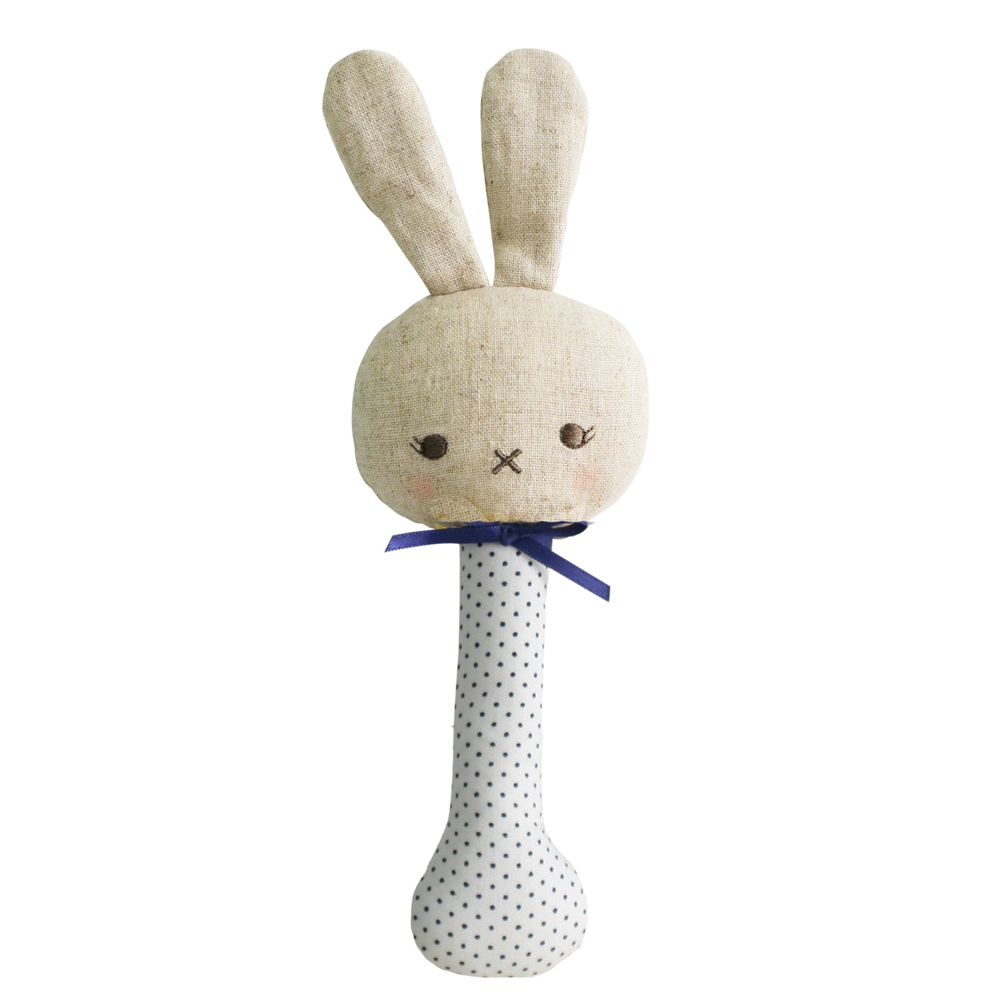 Soft beige bunny rattle with long ears, embroidered face, navy polka-dotted handle, and blue ribbon bow.