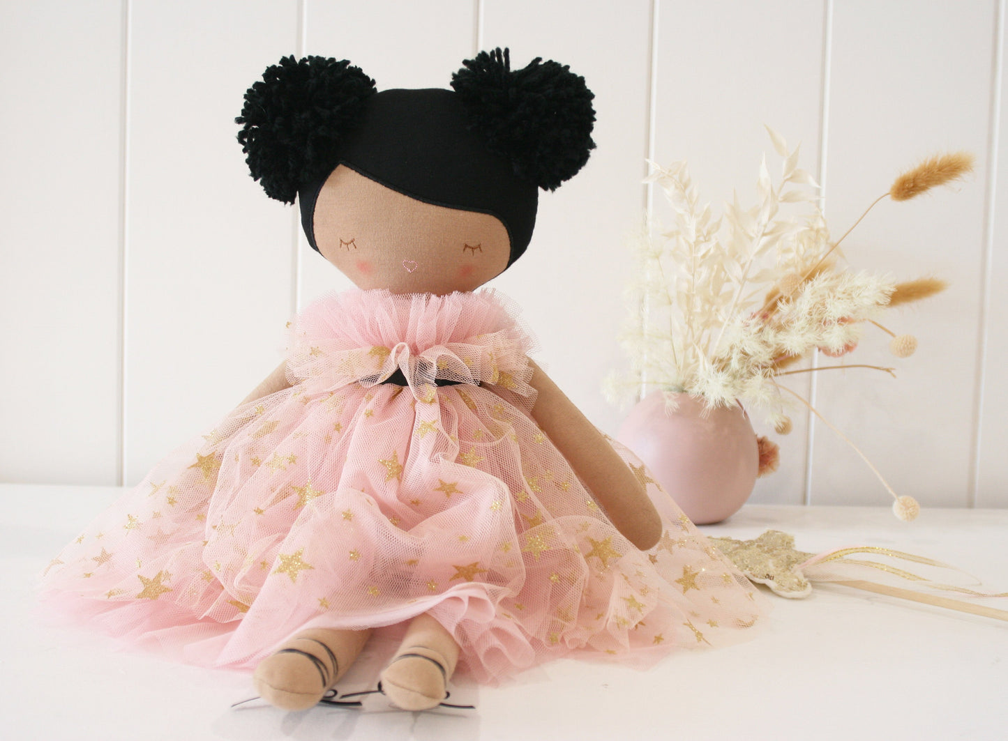 Alimrose Halle Ballerina Doll in a pink tulle dress with gold stars and black pom-pom hair, handcrafted with care.
