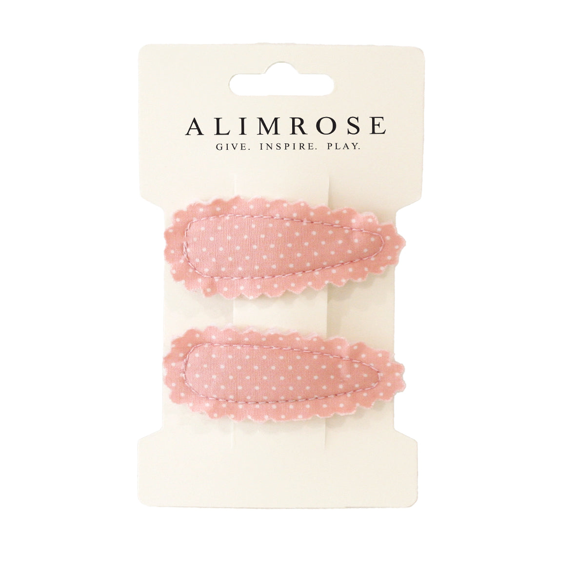 Alimrose hair clip set in pink with white polka dots, perfect for securing hair and completing outfits.