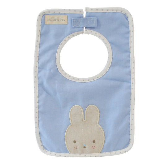Alimrose Linen Bunny Bib in blue with cute bunny appliqué and Velcro closure for mealtime.