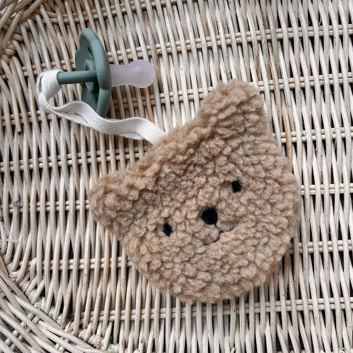 Sherpa Bear Paci Comforter in Caramel color, soft and cuddly design, ideal for soothing babies and keeping pacifiers secure.