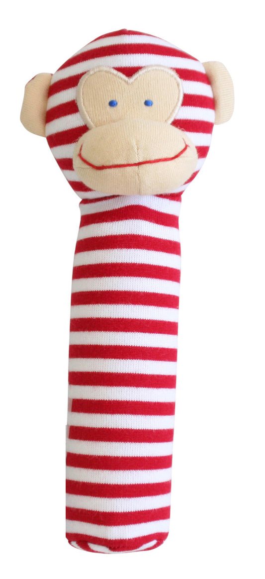 Cute red striped monkey squeaker toy for babies, perfect for exploring grasp reflex and learning to squeak.