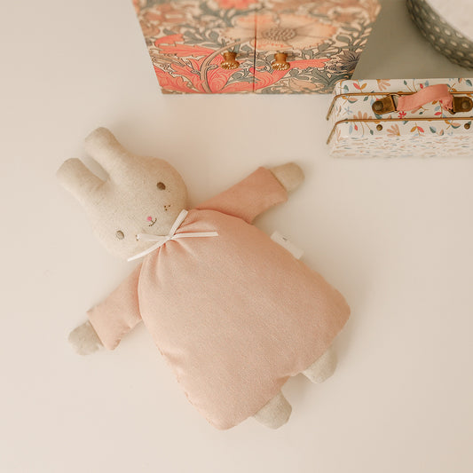 Riley Bunny Rattle 24cm in pink, soft linen cotton toy with embroidered face, perfect newborn gift.