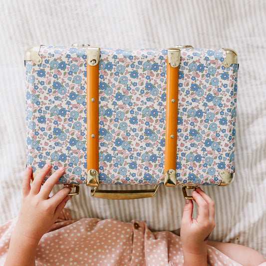 Mini Vintage Case in Liberty Blue floral pattern, perfect for storage and room decor, held by hands on soft background.