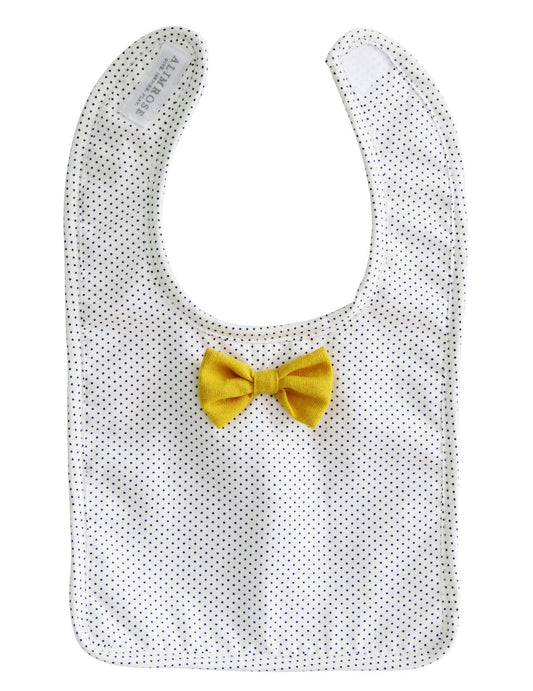 Alimrose Bow Tie Bib in navy pinspot with a yellow bowtie for stylish, functional mealtime for boys.
