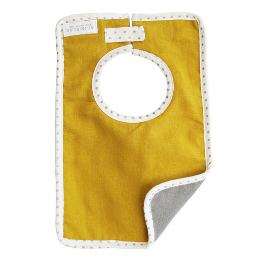 Bobby Bib Butterscotch Linen, stylish bib made of linen and cotton with absorbent backing for kids.