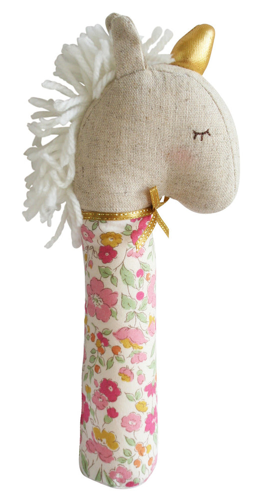 Yvette unicorn squeaker toy in rose garden fabric, perfect for babies to explore grasp reflex and enjoy squeaking sounds.
