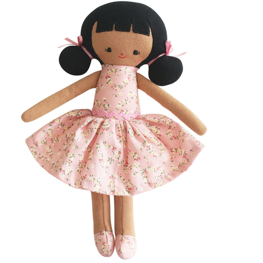 Alimrose Audrey Doll 26cm, cute embroidered face, fabric hair in stylish side buns, wearing a floral pink dress.