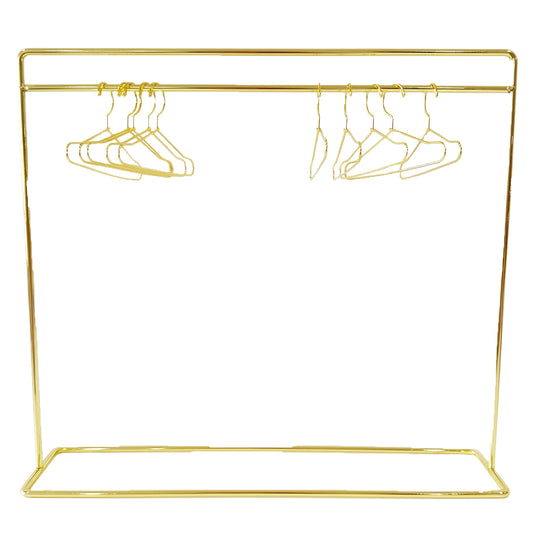 a gold metal rack with swingers