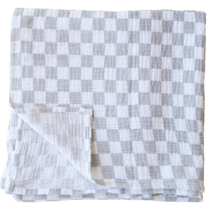 Dove grey and white muslin swaddle with a soft checkered pattern, lightweight and breathable fabric.