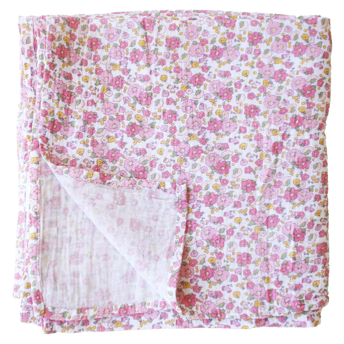 Soft muslin swaddle with pink and yellow rose garden floral pattern on white background.