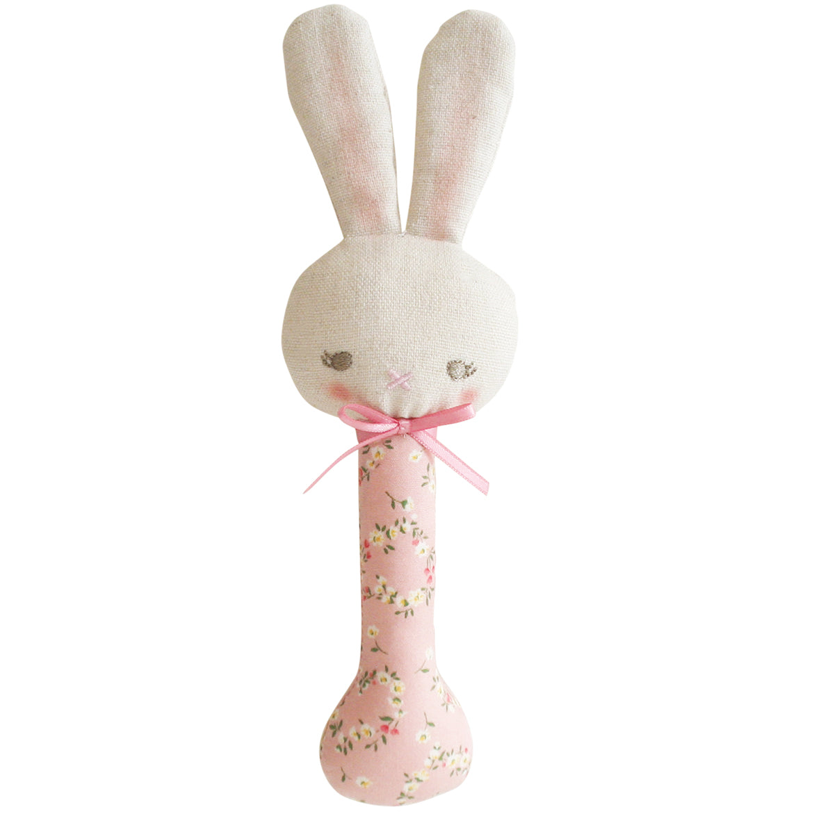 Pink plush bunny rattle with long handle decorated in small floral print and a pink ribbon bow around the neck.