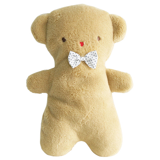 Soft beige plush teddy bear with round ears, embroidered eyes, nose, and white polka dot bow tie.