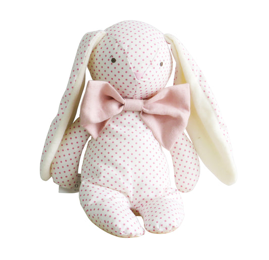Soft fabric floppy bunny with pink polka dots and a large pale pink bowtie.