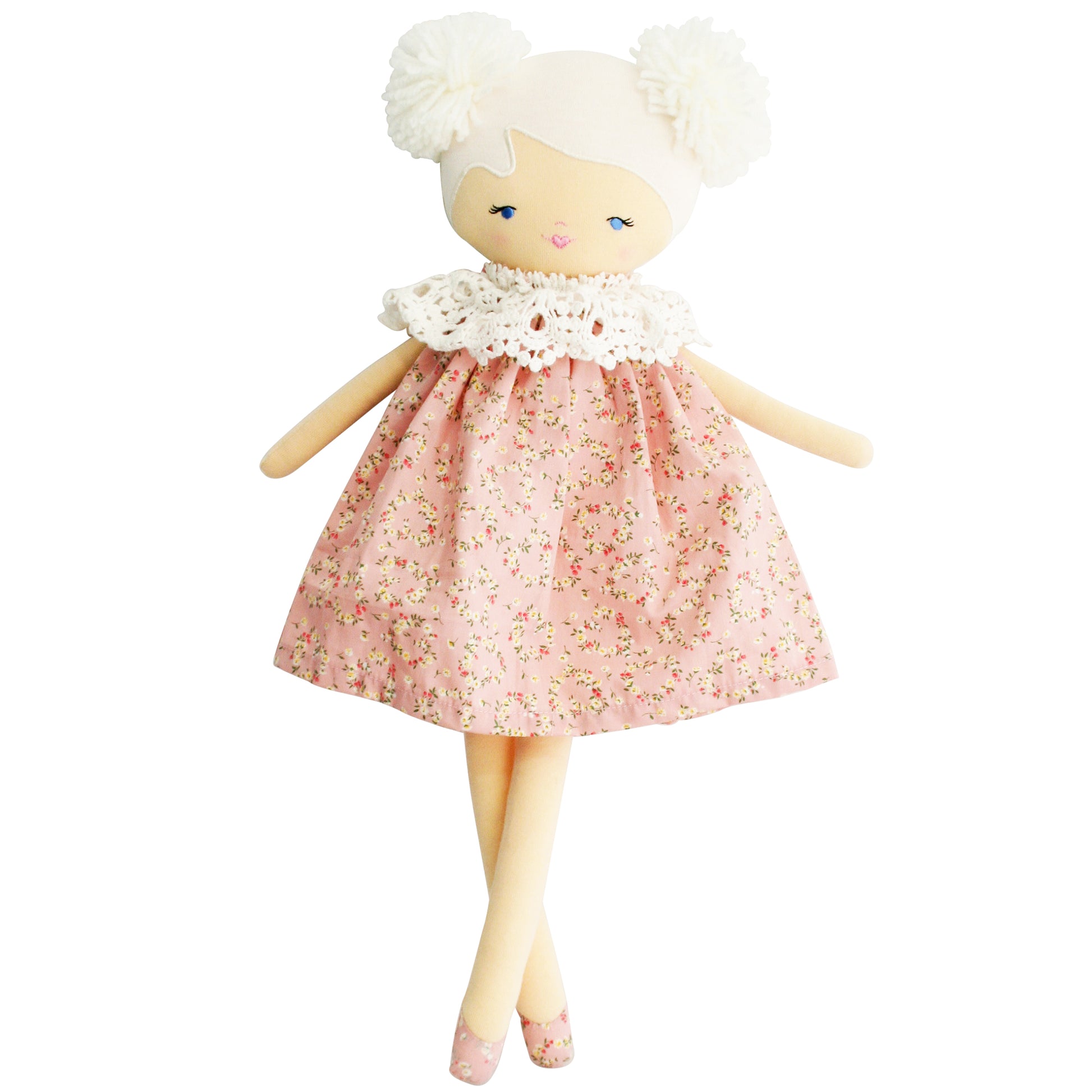 Cloth doll with cream skin, white yarn hair in two puffs, wearing pink floral dress with white lace collar.