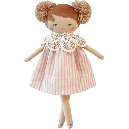 Soft fabric doll with brown yarn hair in two pom-pom pigtails, wearing a pink and white striped dress with a white lace.