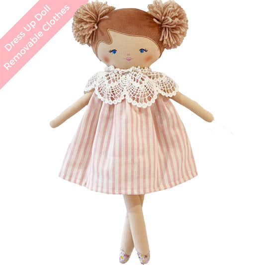 Soft fabric doll with light brown yarn hair in pigtails, wearing a pink and white striped dress with lace collar.