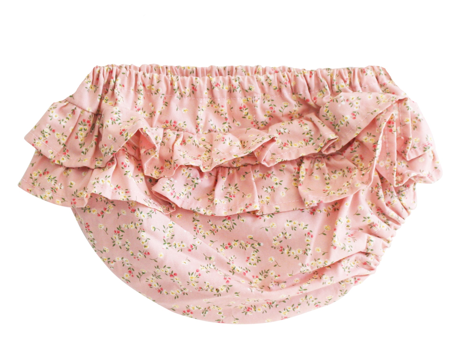 Pink cotton baby bloomers with layered ruffles and a small floral posy heart print.