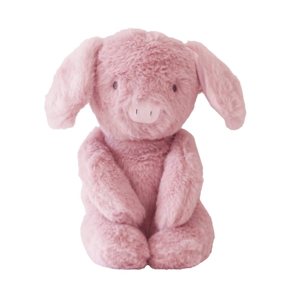 Soft pink plush pig toy sitting upright with floppy ears and embroidered facial details.