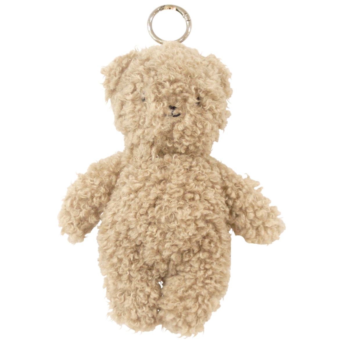 Small oatmeal-colored teddy bear bag charm with curly plush fur and silver keyring attached to the head.
