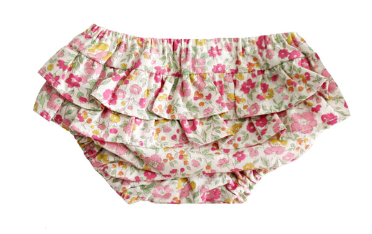 Pink and white floral ruffle bloomers for babies with layered ruffle detail.