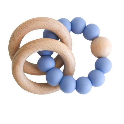 Beechwood teether ring with smooth natural wood and soft matte blue silicone beads.