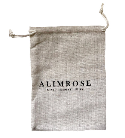 Natural linen drawstring pouch with Alimrose logo and slogan in black text.