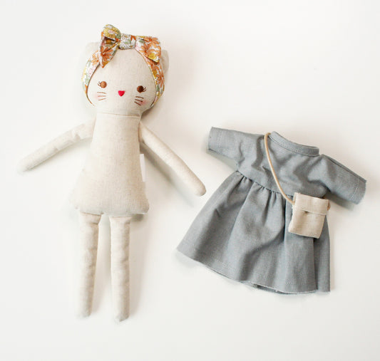 Mini Lilly Kitty doll with removable grey linen dress and floral headband, plus a cute crossbody bag.
